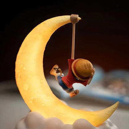A rear view of a Luffy figure seated on a crescent moon lamp