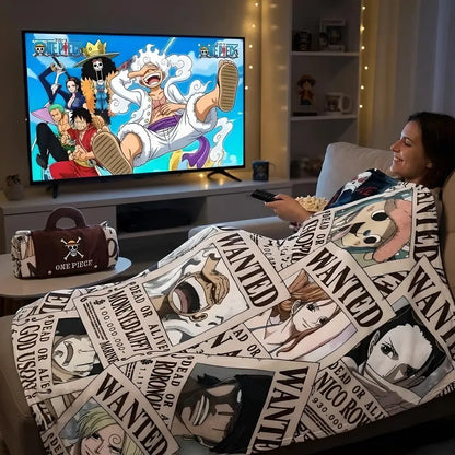Woman relaxing on couch using One Piece Straw Hat Pirates wanted poster fleece throw blanket while watching anime