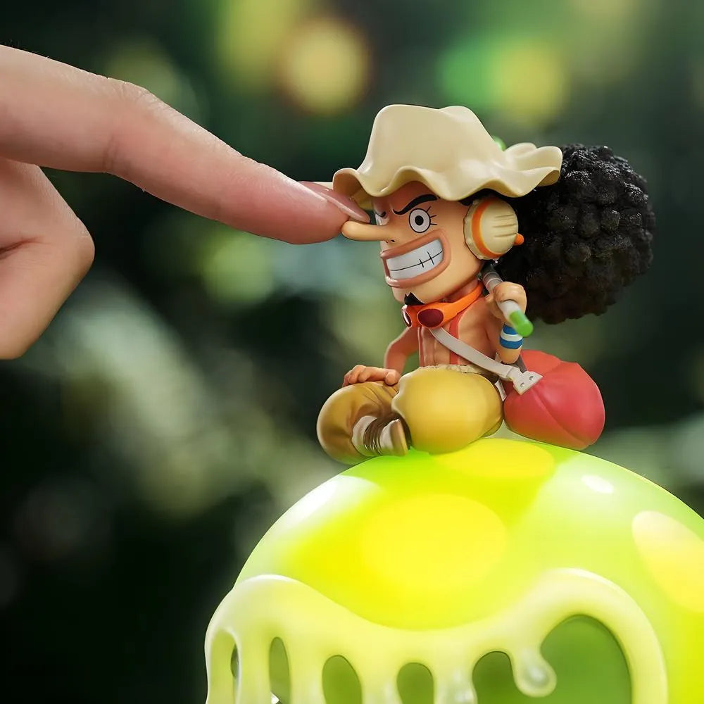 Interactive display showing hand touching Usopp figure long nose on Pop Green night light