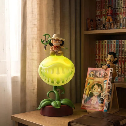 Glowing Usopp Pop Green anime ambient light on bookshelf beside One Piece manga collection